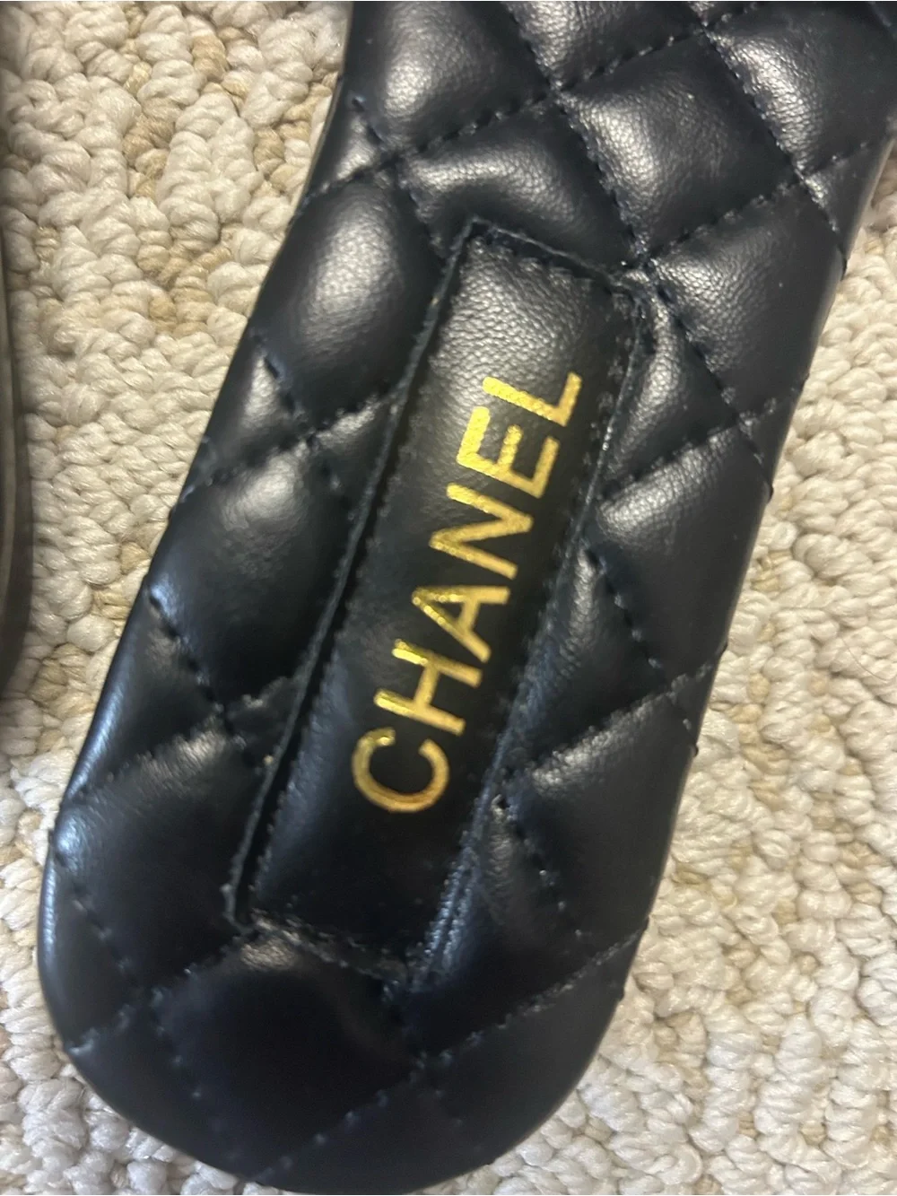 CHANEL Black Quilted Leather Slide Mules with Gold CC Chain